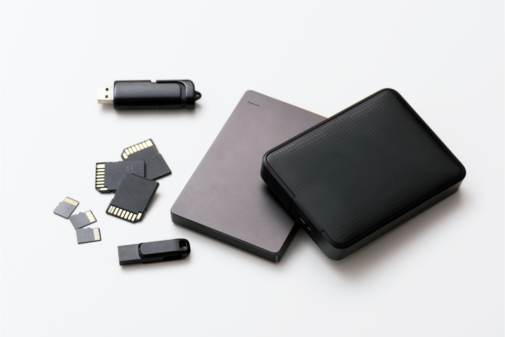different types of portable digital storage devices on a white background