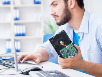 A technician recovering data from a damaged drive