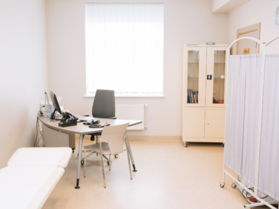 A medical office with a computer on a table