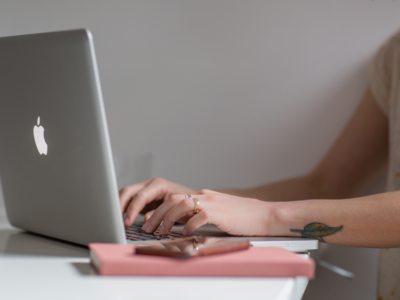 A small business owner trying to make her Apple laptop work