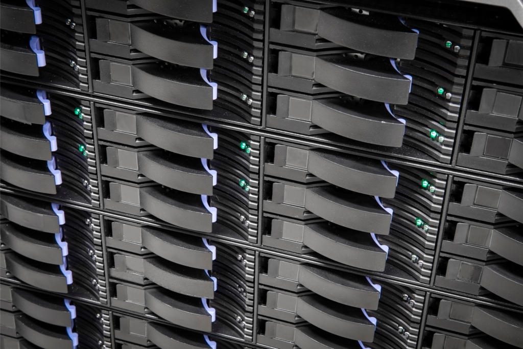 A close-up view of multiple hard drives arranged in a large Storage Area Network