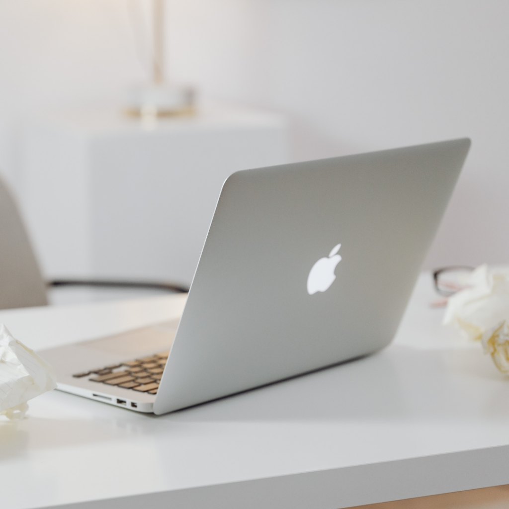 White Macbook on the table