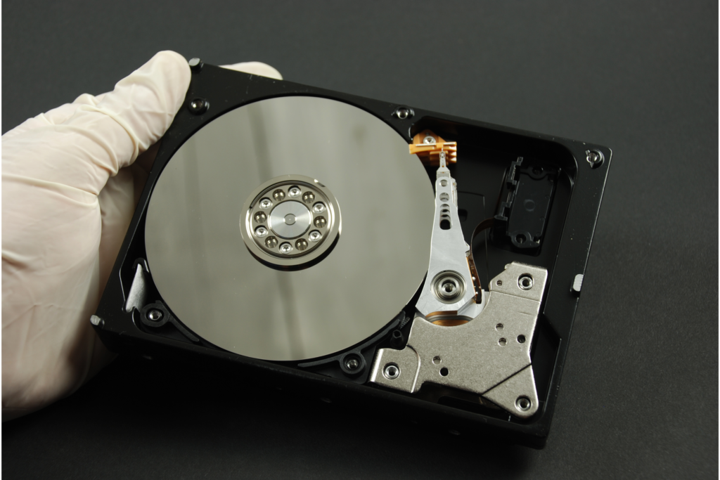 A data recovery specialist recovering lost files from a corrupted drive