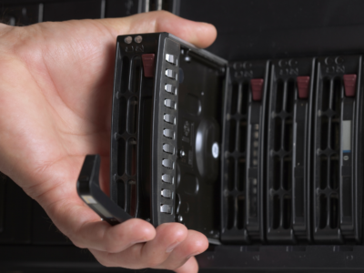 A person recovering data from a failed RAID Network