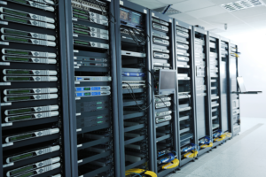 A large server room filled with multiple RAID arrays for data storage and backup.